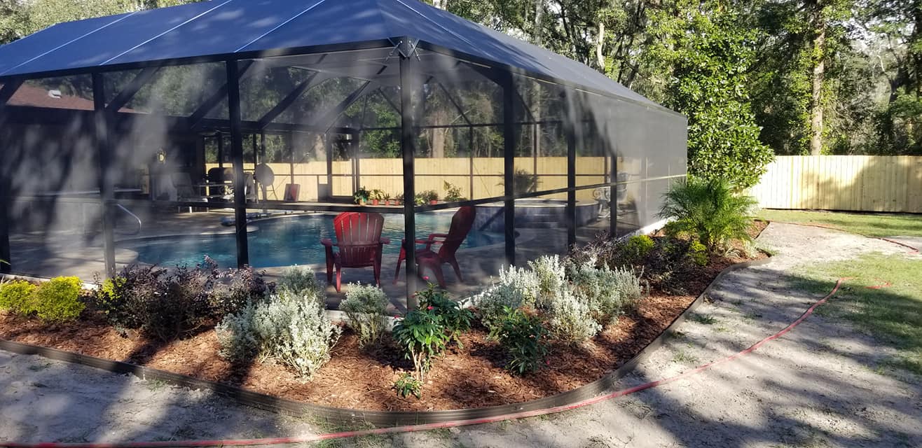 Storm debris cleared from commercial property grounds in Land O' Lakes, FL